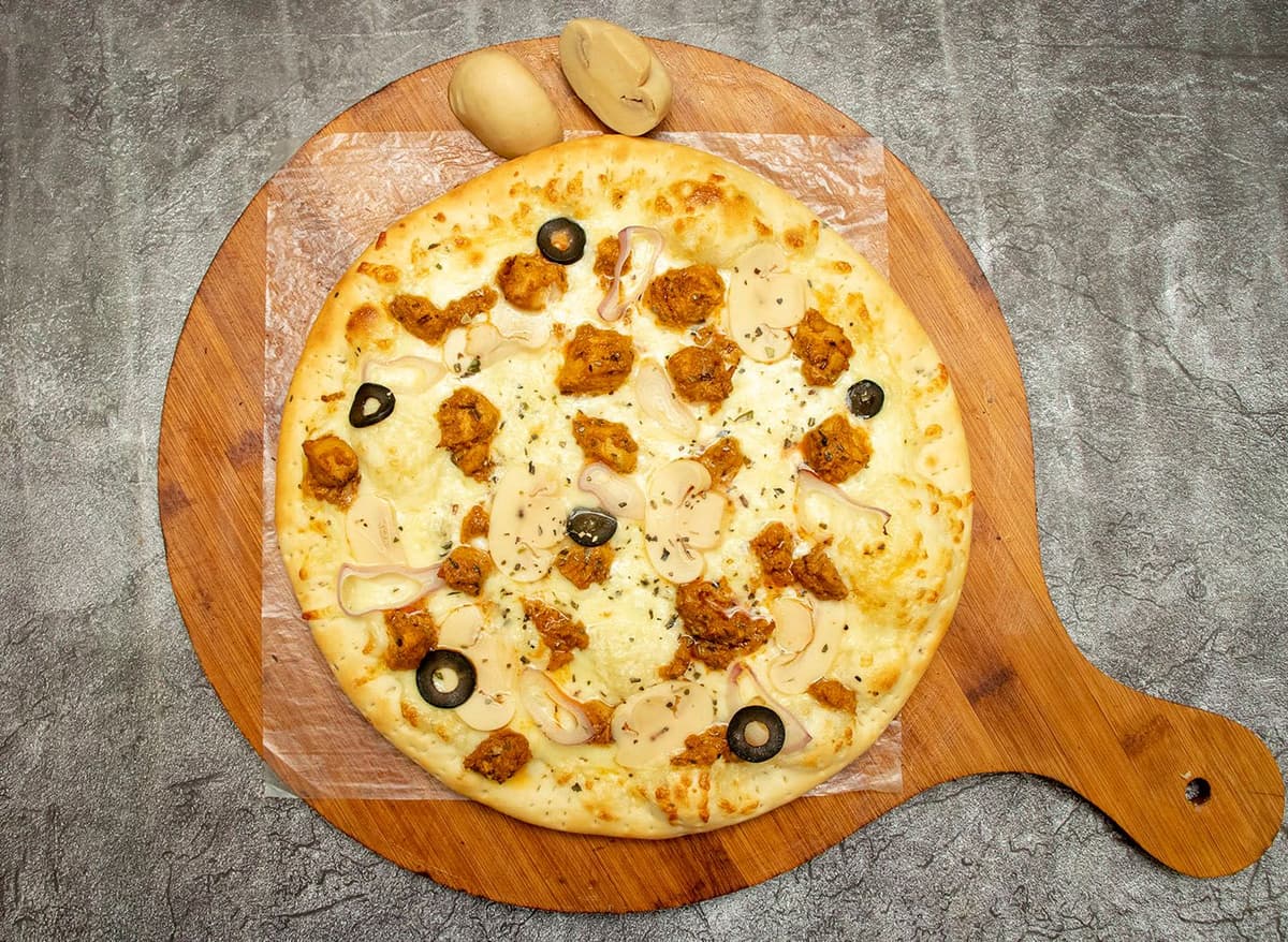 (Free chef special pasta with any 12" pizza)
