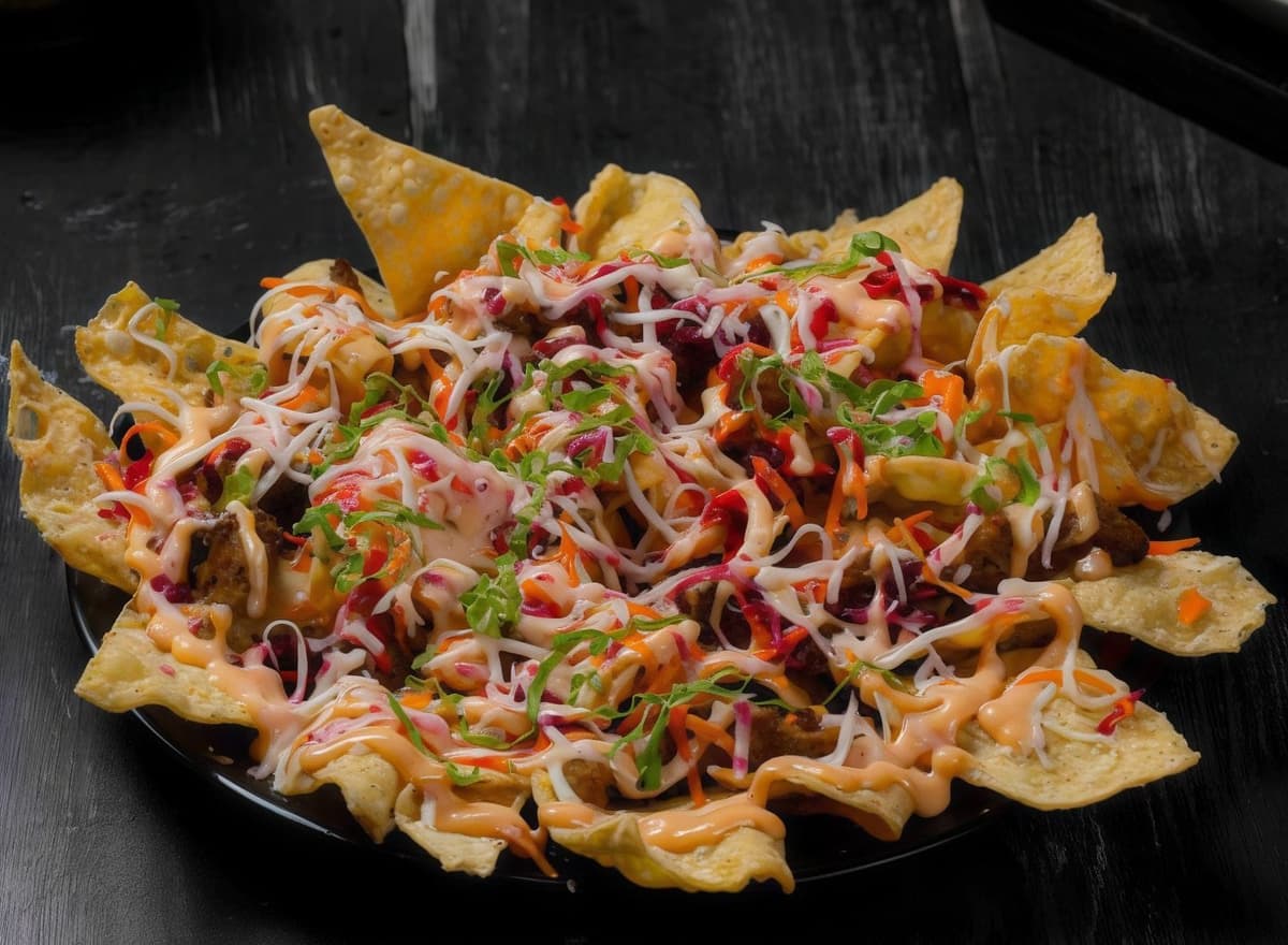 Nachos with cheese, beef, sauce etc.