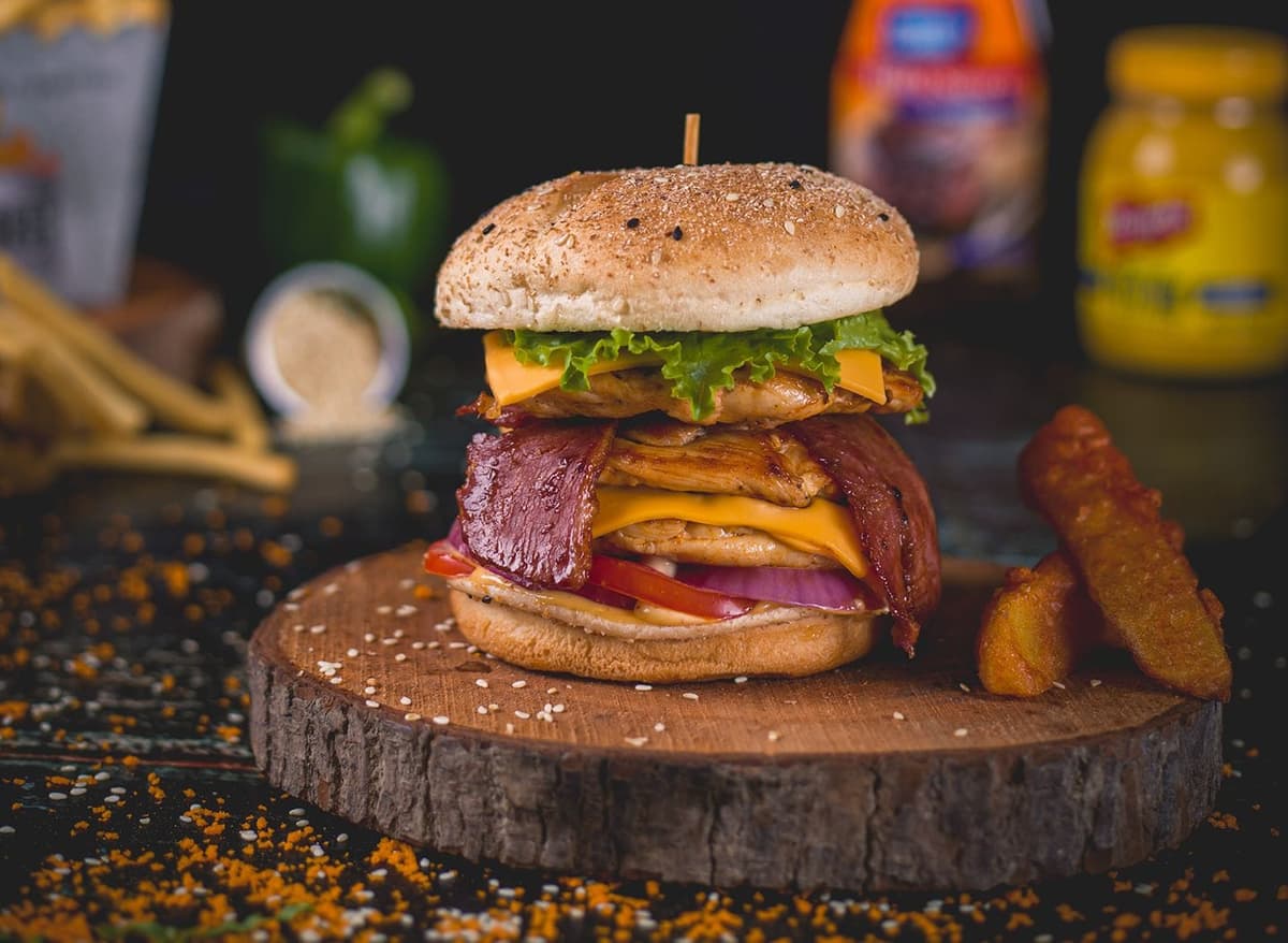 Bacon Wrapped Beef Bites with fresh onions, tomato, lettuce, cheese etc.