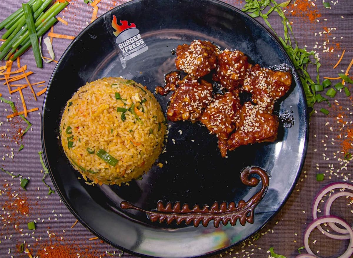 Rice loaded up in a flavorful & colorful BBQ chicken and cheese.